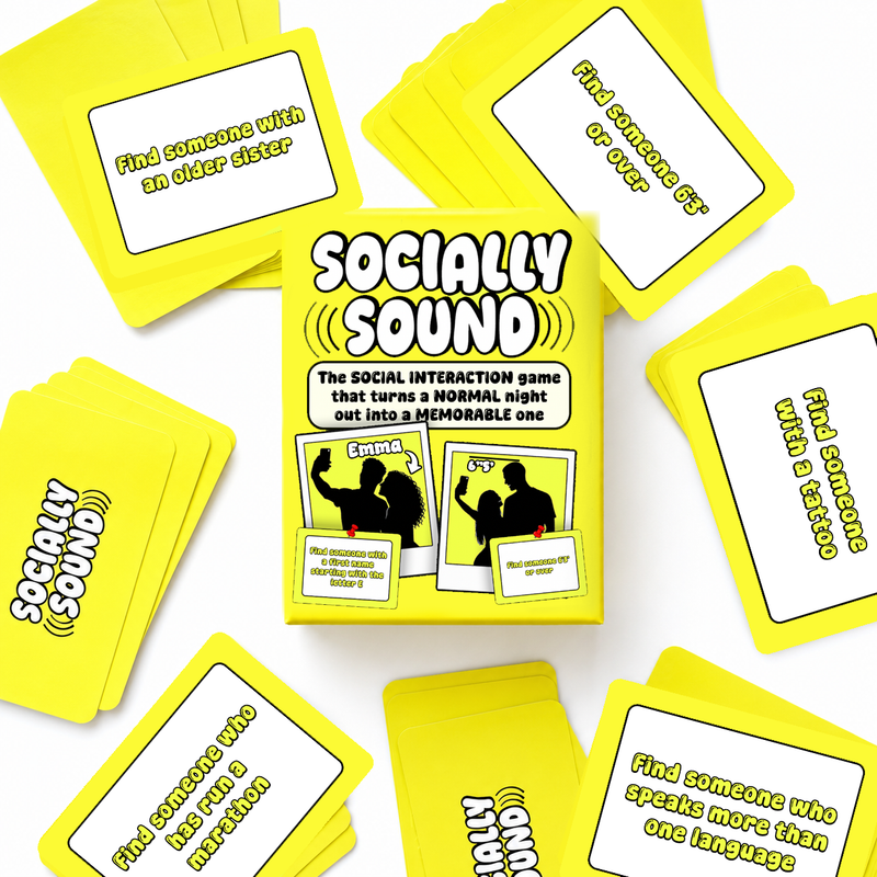 The 'Socially Sound' social interaction game and its yellow cards are arranged in a flat-lay pattern on a white background.